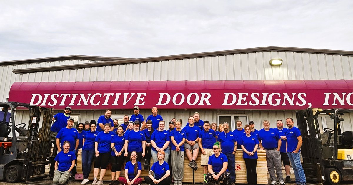 The Distinctive Door Designs team outside the company plant in Princeton, Minnesota